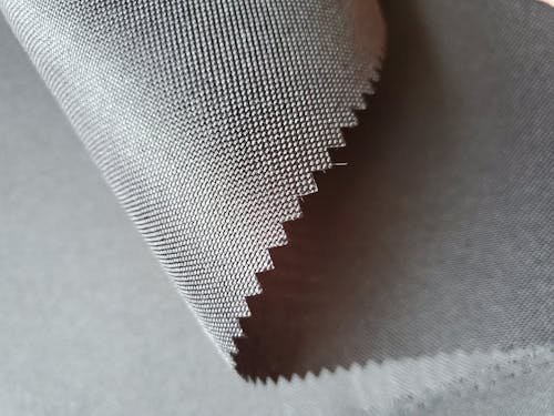 Close-Up Shot of Brown Textile