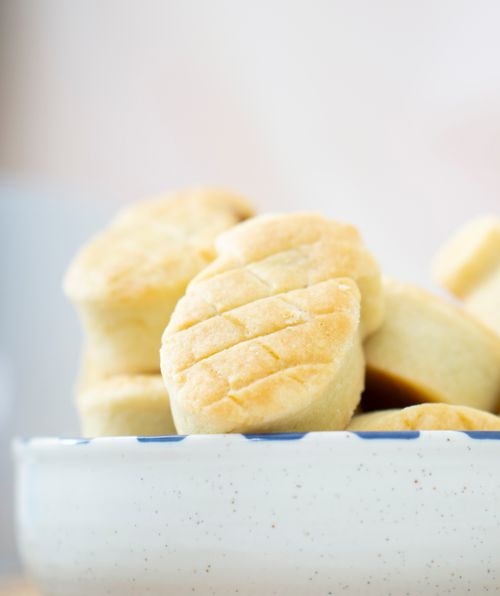 Free Close-up of homemade cookies in a white bowl, showcasing a delicious treat. Stock Photo