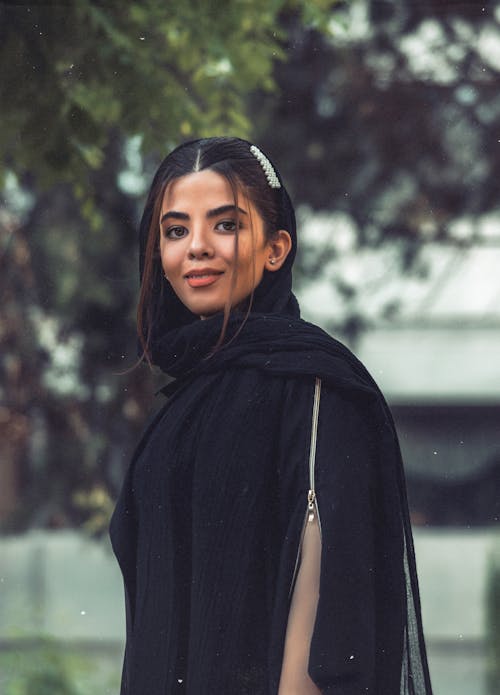 Woman Wearing Black Top Smiling