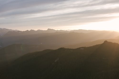 Mountains Under White Clouds