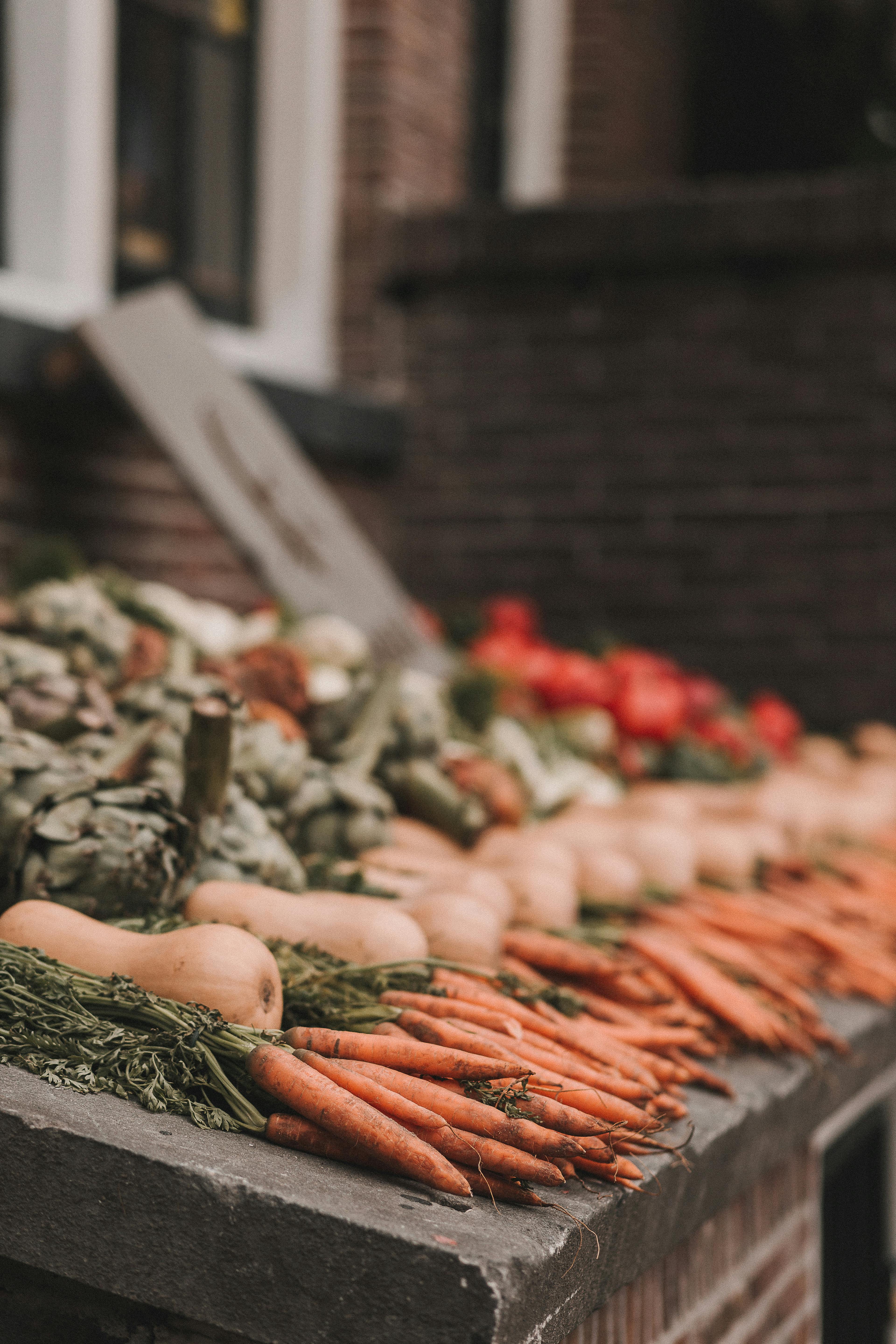photo of carrots displayed in street market