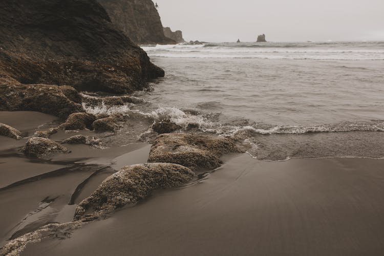 Photo Of Waves Crashing On Seashore