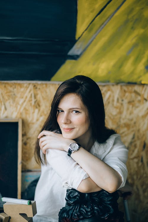 Woman in White Shirt Smiling