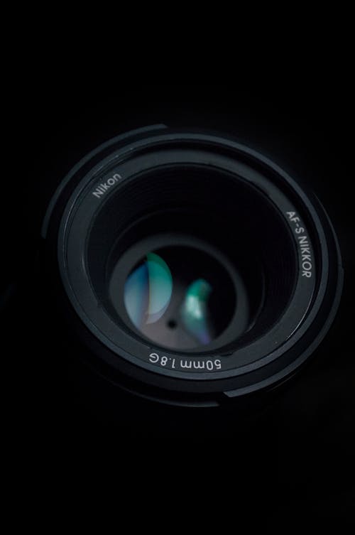 Black Camera Lens in Close-up Shot 