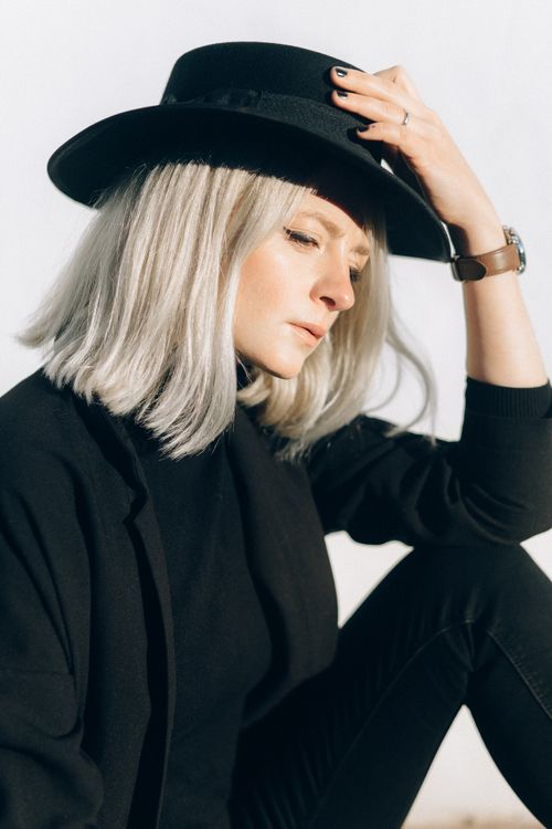 Woman in Black Coat and Black Hat · Free Stock Photo