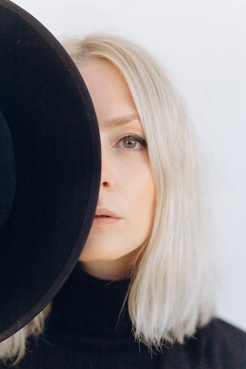 Woman in Black Shirt With Blonde Hair