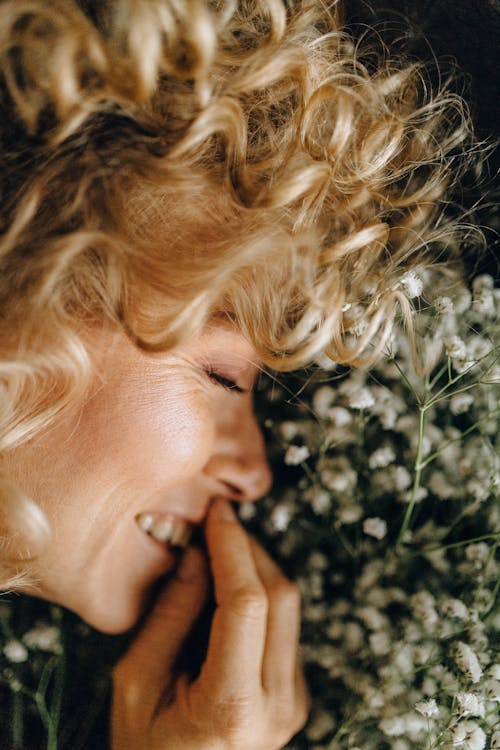 Close-Up Photo of Woman's Face Smiling