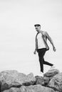 Man Walking on Rocks