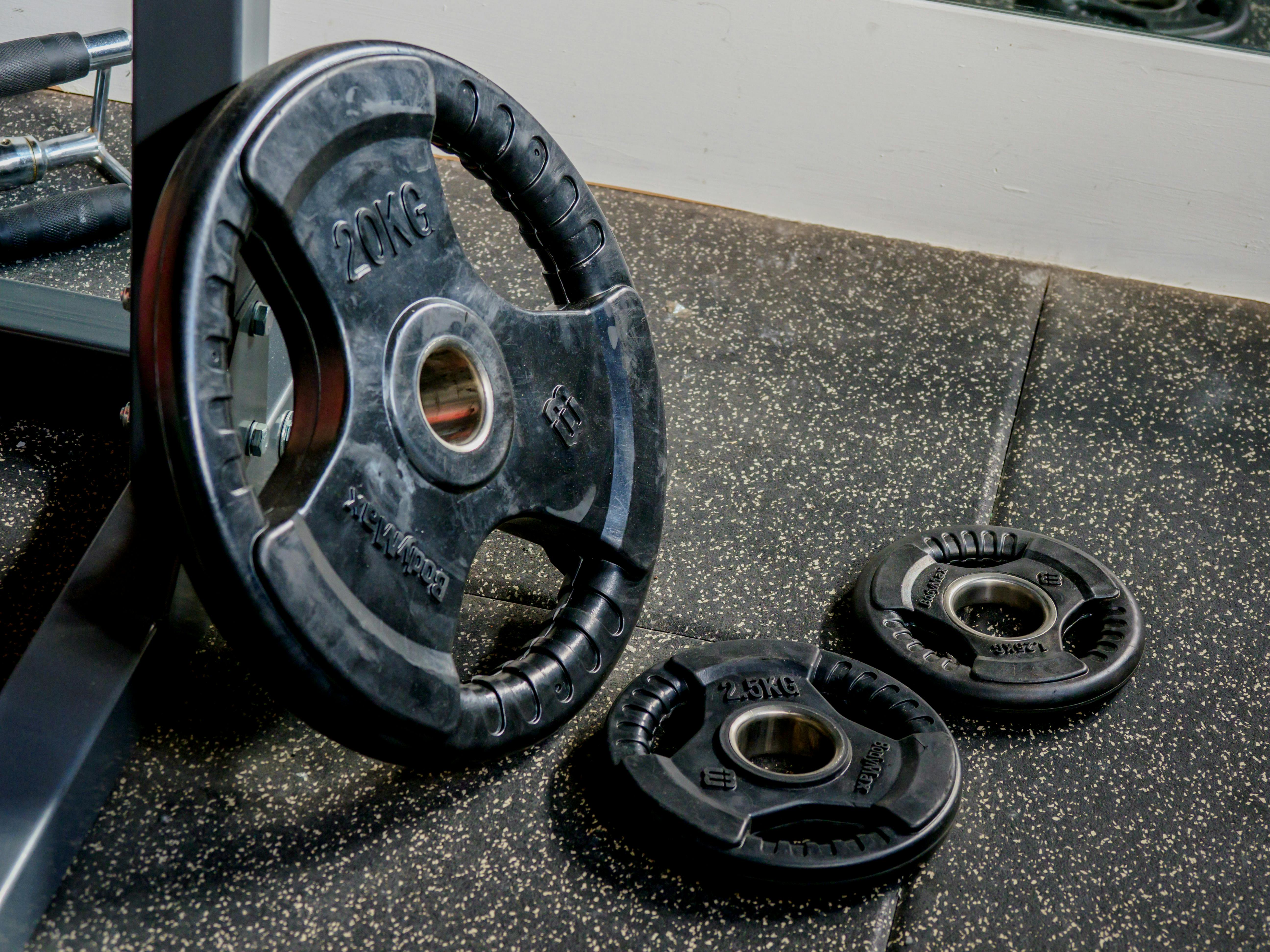 Weight Room With Heavy Weights And Resistance Training Equipment