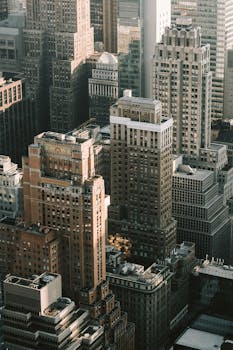 Captivating aerial view of New York City's iconic skyscrapers highlighting architectural diversity.