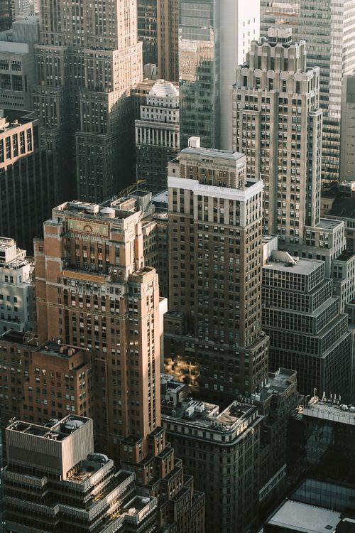 Free Captivating aerial view of New York City's iconic skyscrapers highlighting architectural diversity. Stock Photo