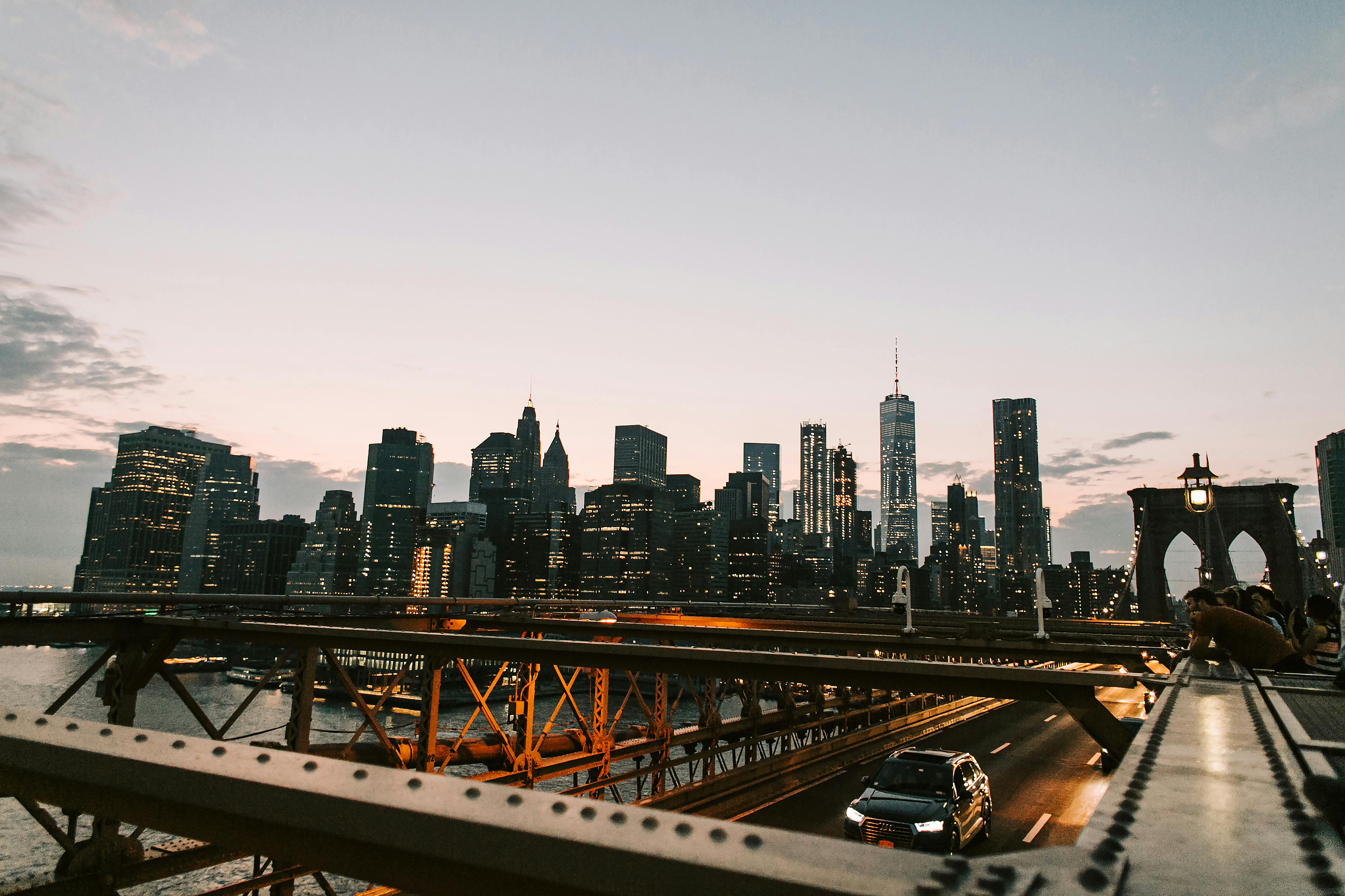 illuminated nyc downtown from brooklyn bridge