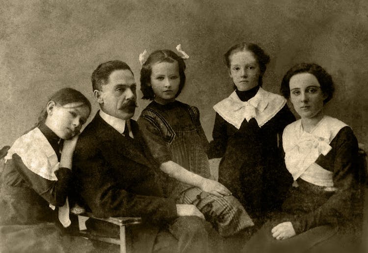 Old Photo Of Family In Studio