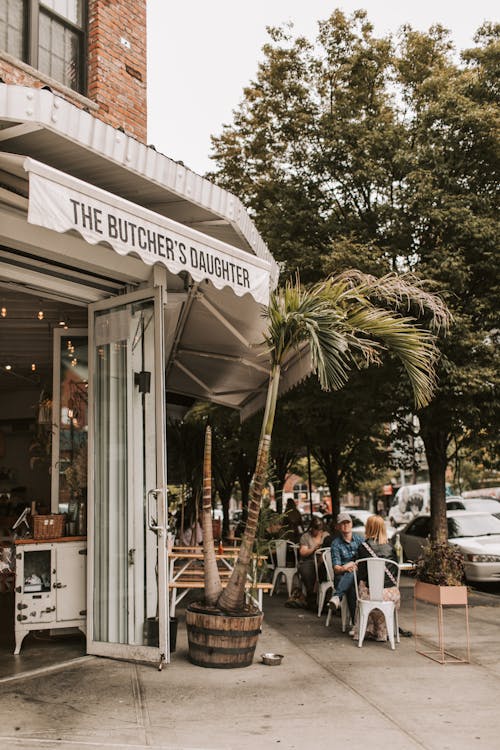 Exterior of cozy street cafe on daytime