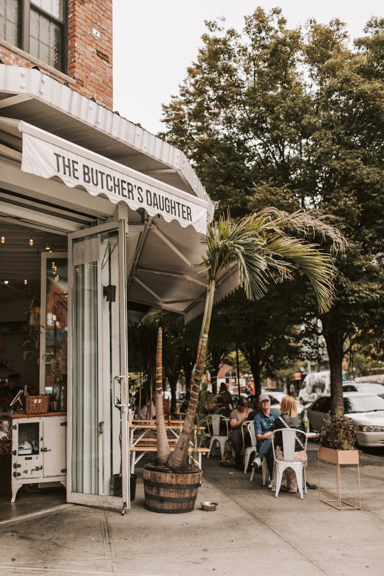 Exterior Of Cozy Street Cafe On Daytime