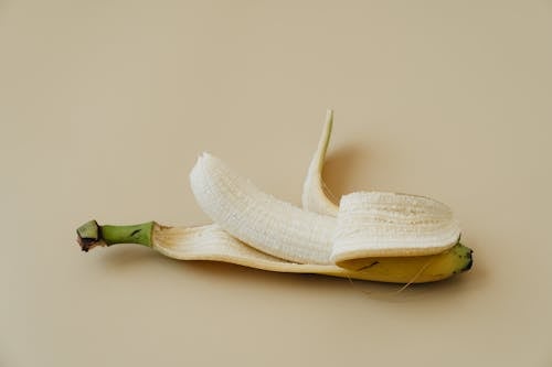 Безкоштовне стокове фото на тему «банан, впритул, очищений»