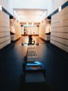 Black Wooden Chair on Hallway