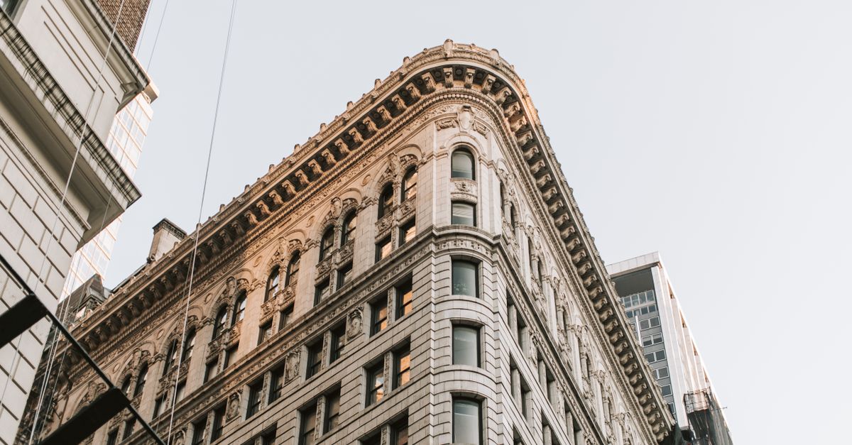 Captivating view of the historic Flatiron Building in New York City under clear skies.