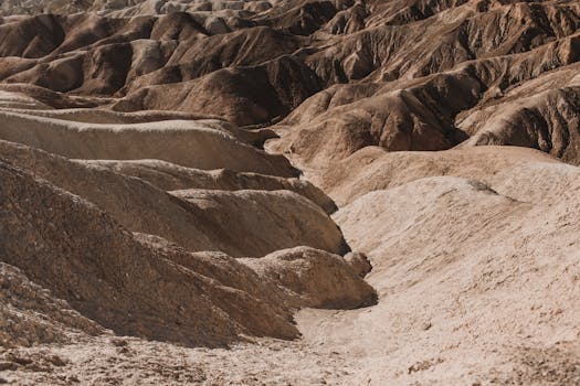 A captivating view of rugged, dry terrain in Death Valley's desert landscape.