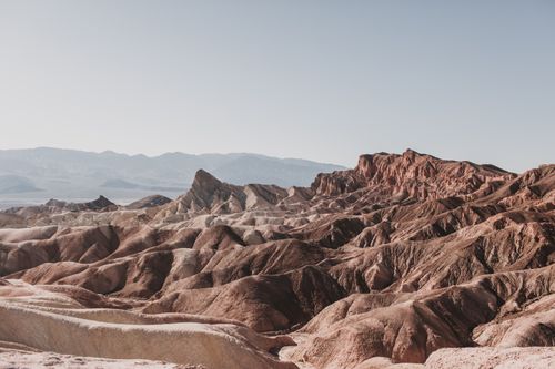 Free Breathtaking daylight view of Death Valley's iconic brown and barren mountains. Stock Photo