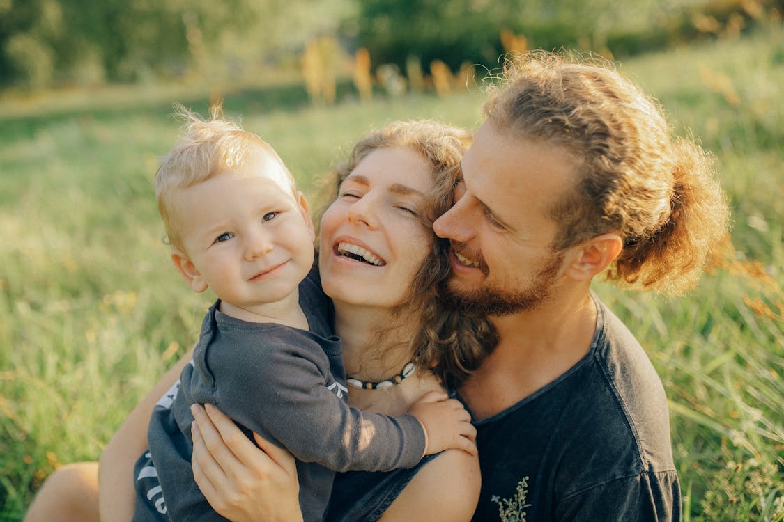 Free Blond Baby with his Parents Stock Photo