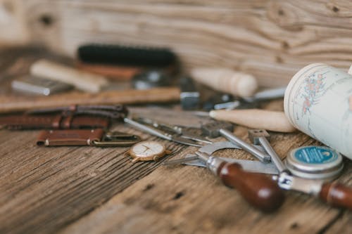 Tools and Watch on Wood