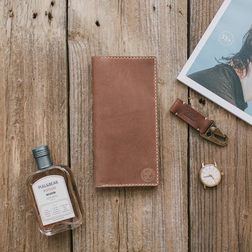 Close-up Photo of Brown Leather Bifold Wallet 