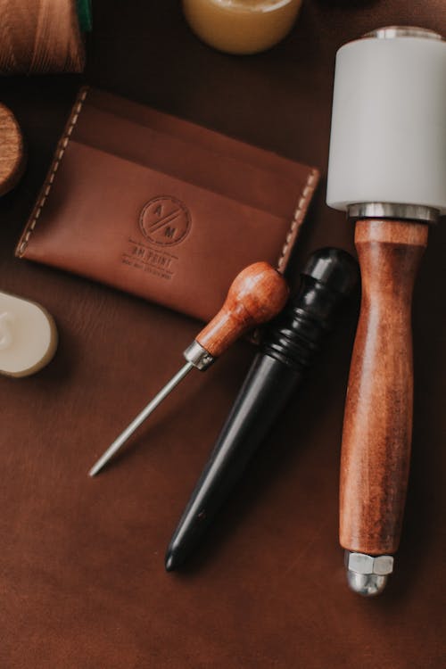 Close-up of a Leather Card Holder and Tools for Leather Crafting 