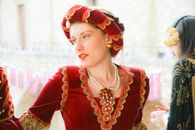 Woman in Red and Gold Traditional Dress