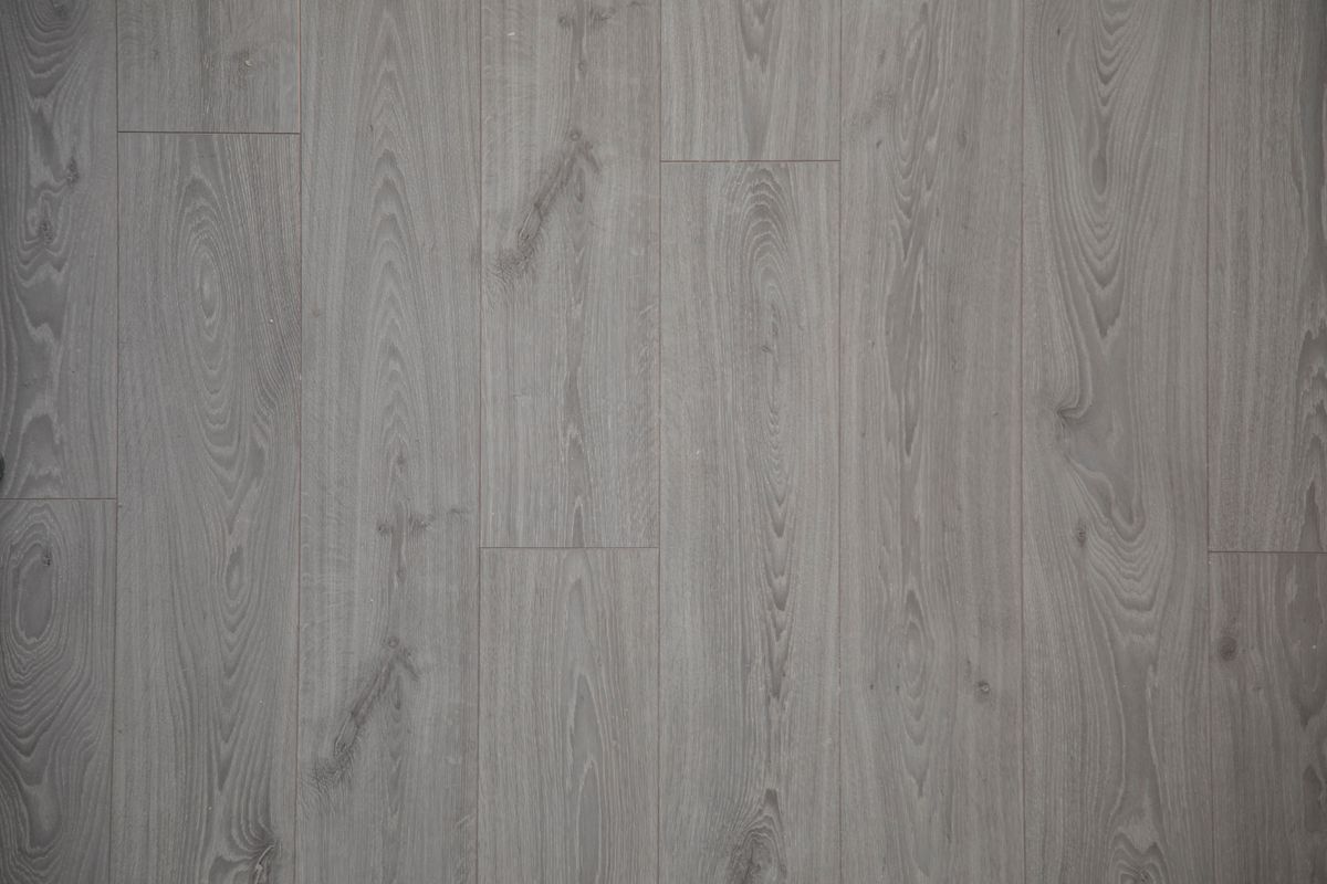 Professional flooring preparation and precise plank layout in a Richmond home