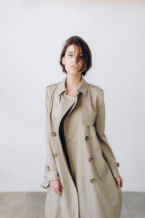 Model in a Long Gray Double-Breasted Coat