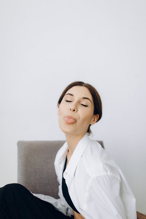 Woman Sticking Tongue Out