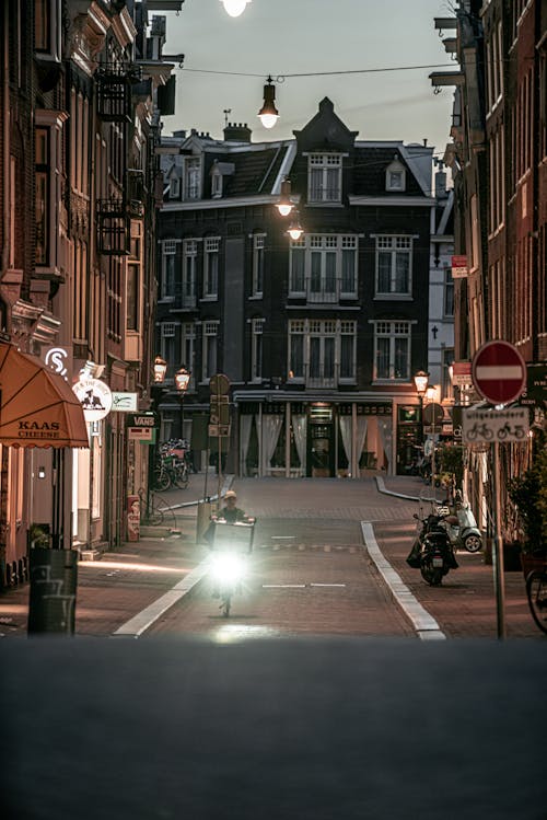 Foto d'estoc gratuïta de amsterdam, bici, cases