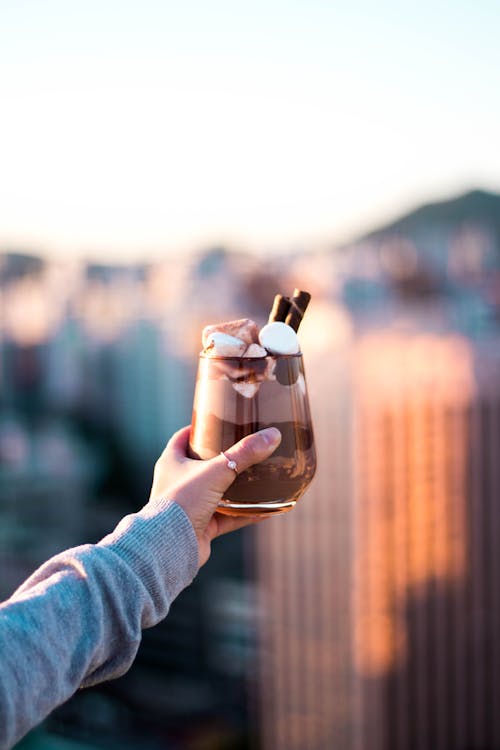Free A Person Holding Chocolate Drink Stock Photo