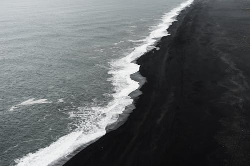 Drone Shot of a Beach with Black Sand