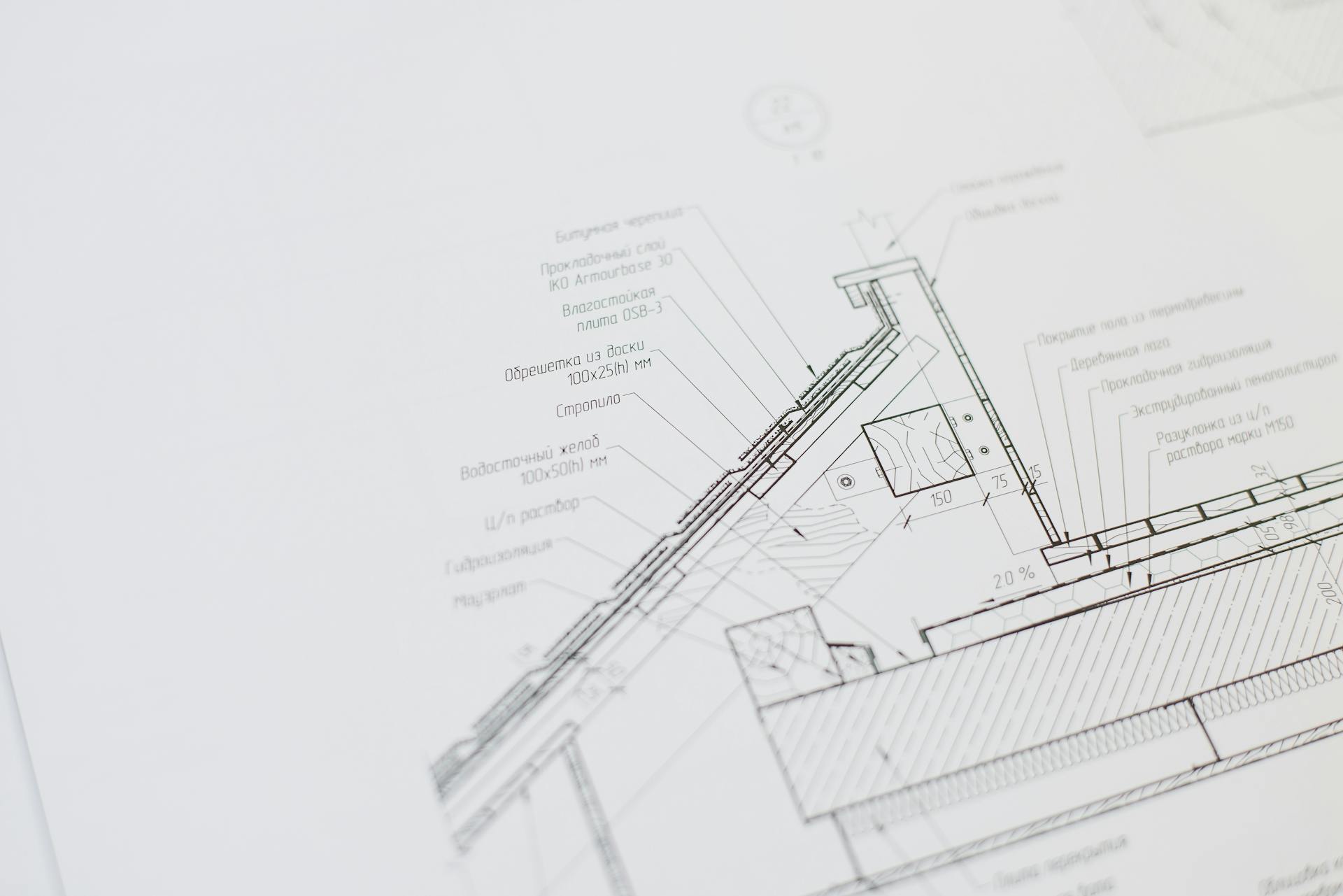 Close-up of a detailed architectural floor plan focusing on technical elements and design specifications.