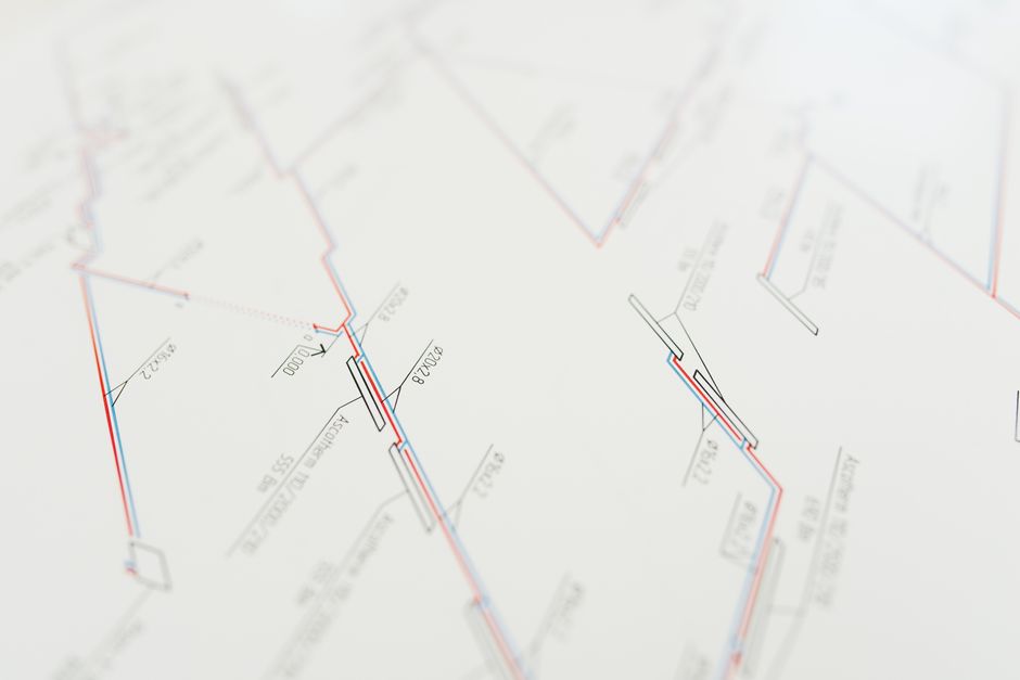 Close-up view of a highly detailed architectural blueprint, showcasing precision in design and measurement.