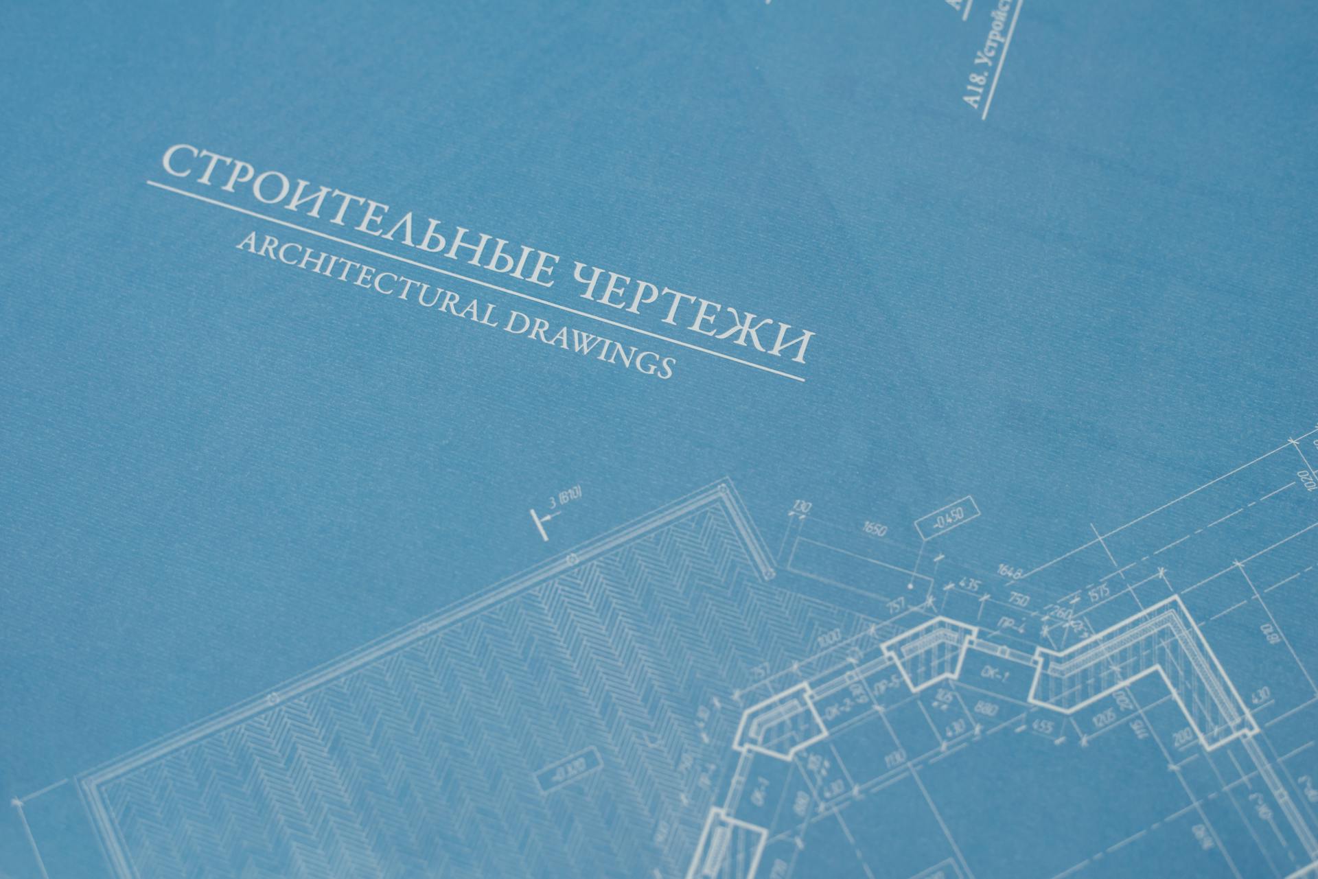 Close-up of detailed blueprints highlighting architectural design elements.