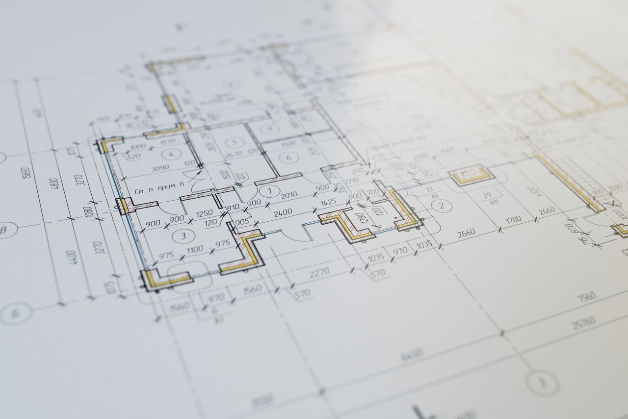 Architect reviewing home blueprints