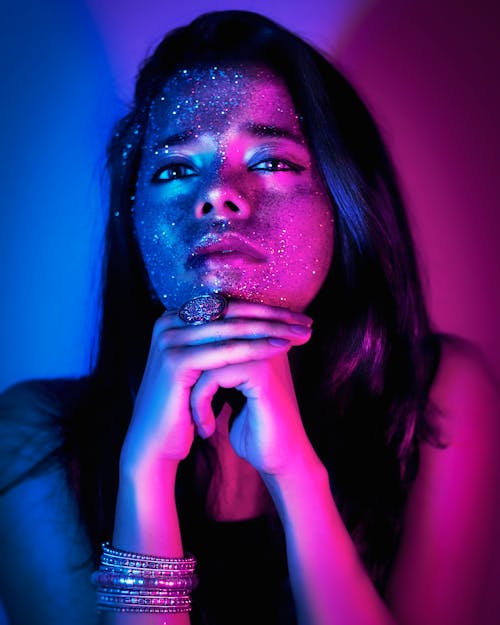 A Portrait of a Woman with Glitters on Her Face