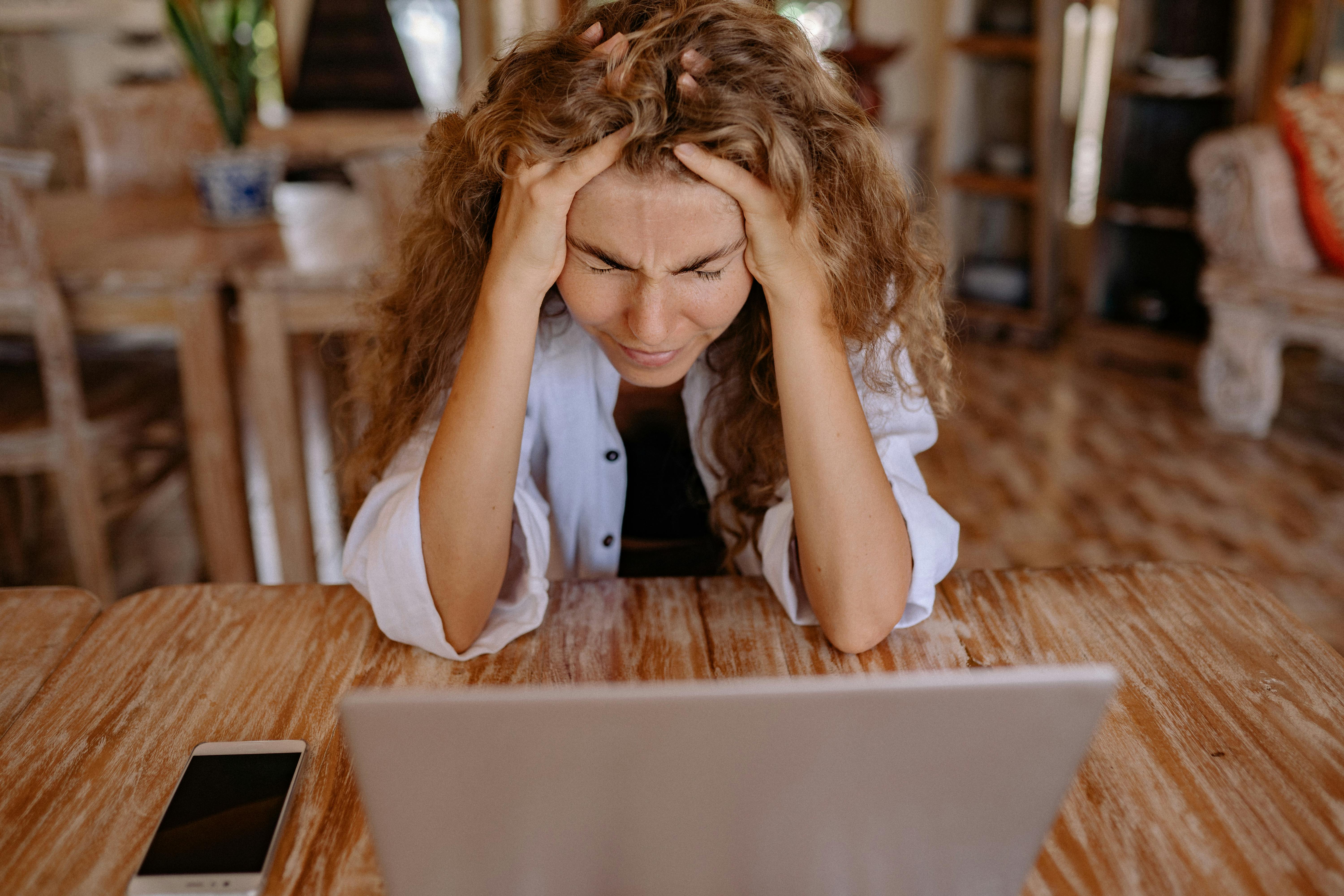 photo of woman showing frustrations on her face