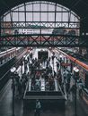 Crowd of people walking on train station