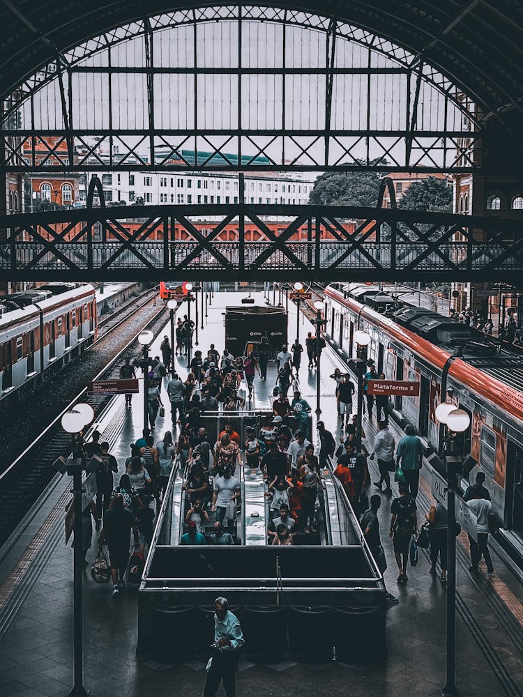 Crowd Of People Walking On Train Station