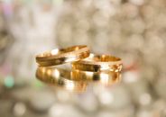 Two Gold-colored Rings in Selective Focus Photography