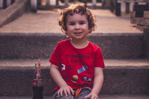 Kostnadsfri bild av ansiktsuttryck, barn, Coca Cola