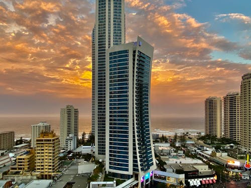 Free Coastal city with modern architecture at sunset Stock Photo