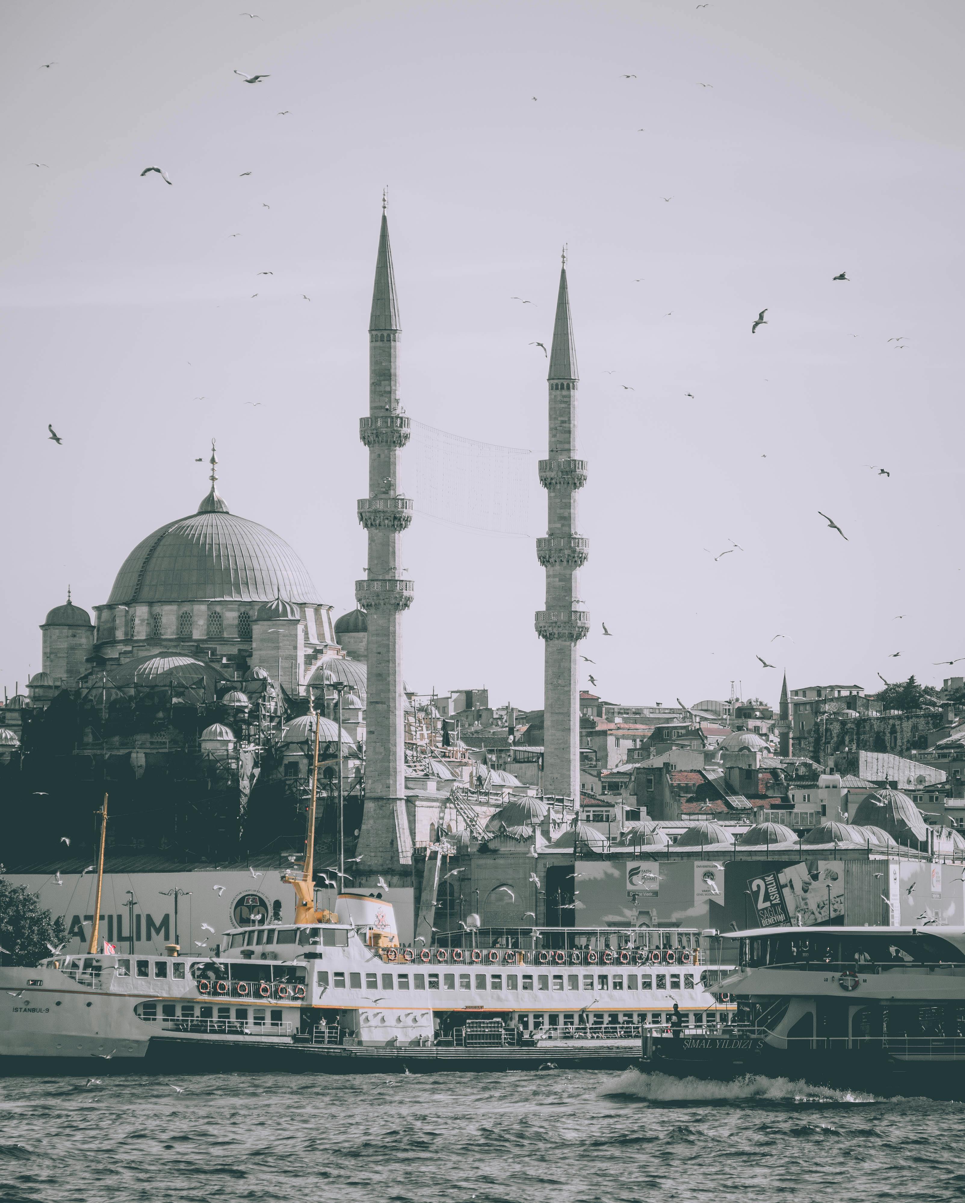 old city on river shore with ancient mosque