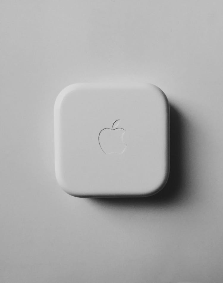 An Apple Logo On A White Surface