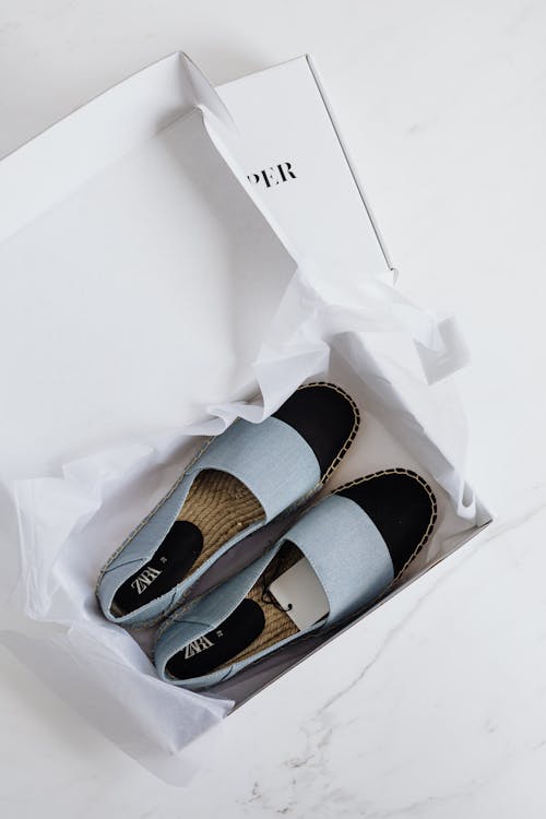 Free Trendy espadrilles shoes in carton package Stock Photo