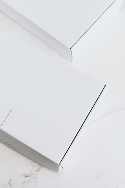 White Boxes on a White Surface · Free Stock Photo